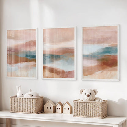 A three-piece wall print set of soft geometric shapes hangs in white frames above the toy organizer, brightening the children's room.