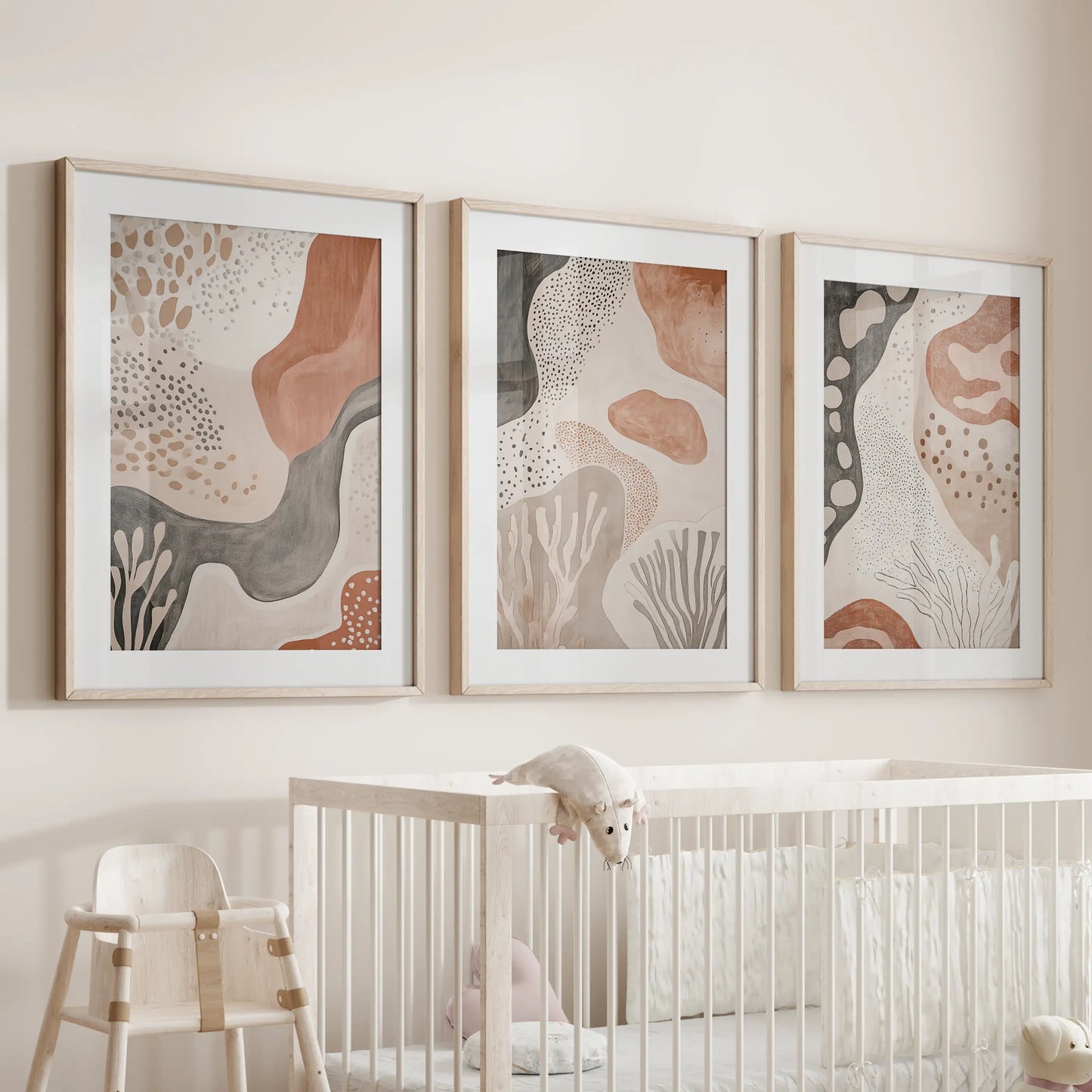 Warm neutral palette abstracts, 3-piece art for the wall in natural wood frames with mats, add calm above the crib in the infant room.