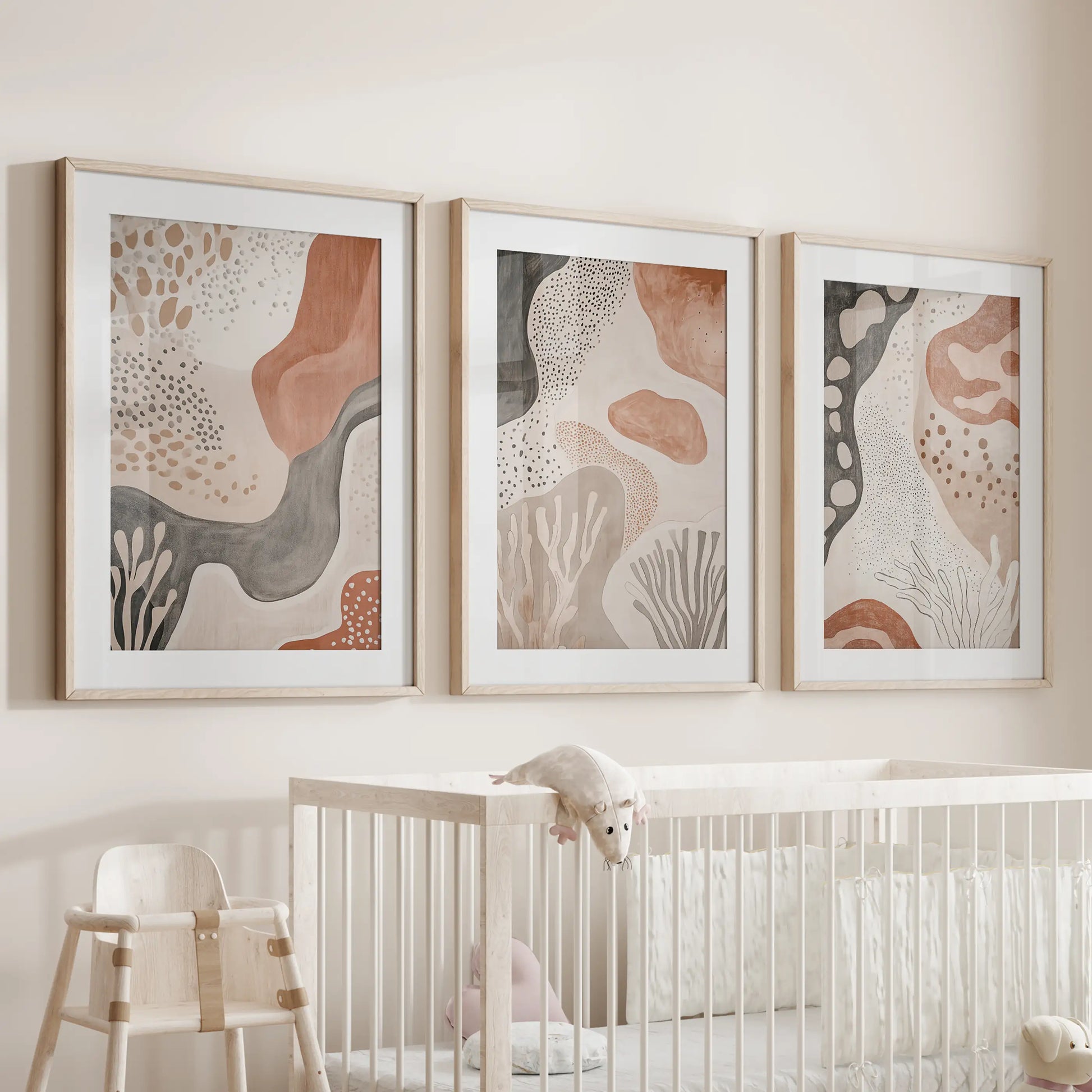 Warm neutral palette abstracts, 3-piece art for the wall in natural wood frames with mats, add calm above the crib in the infant room.