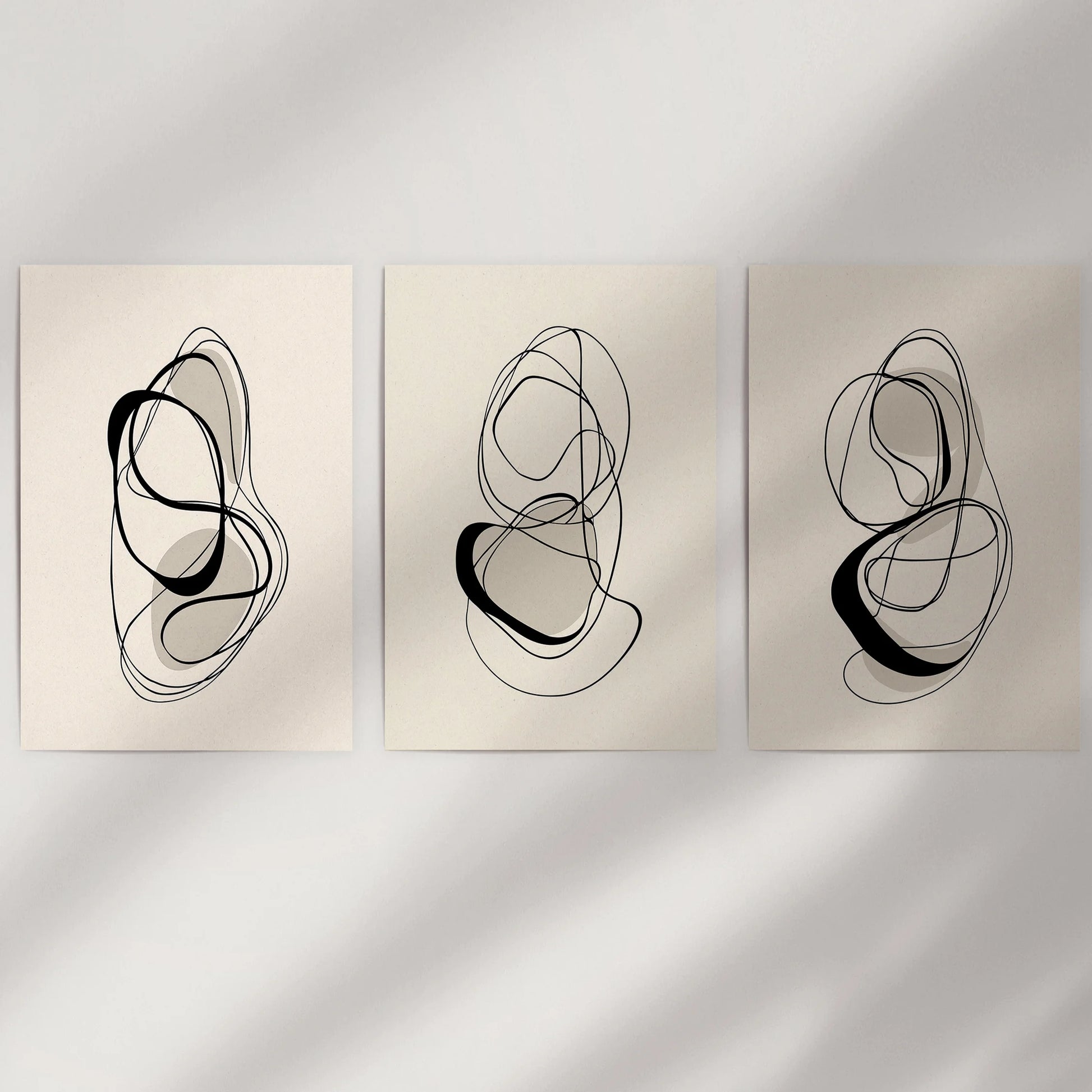Minimalist contour sketches, wall art set of 3 unframed prints, ready to fill a blank wall with understated black-and-beige rhythm and balanced negative space.