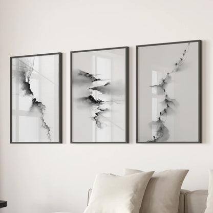 Modern monochrome scenery wall art, a trio, mounts over the lounge sectional in sleek black frames for a calm, graphic focal point.