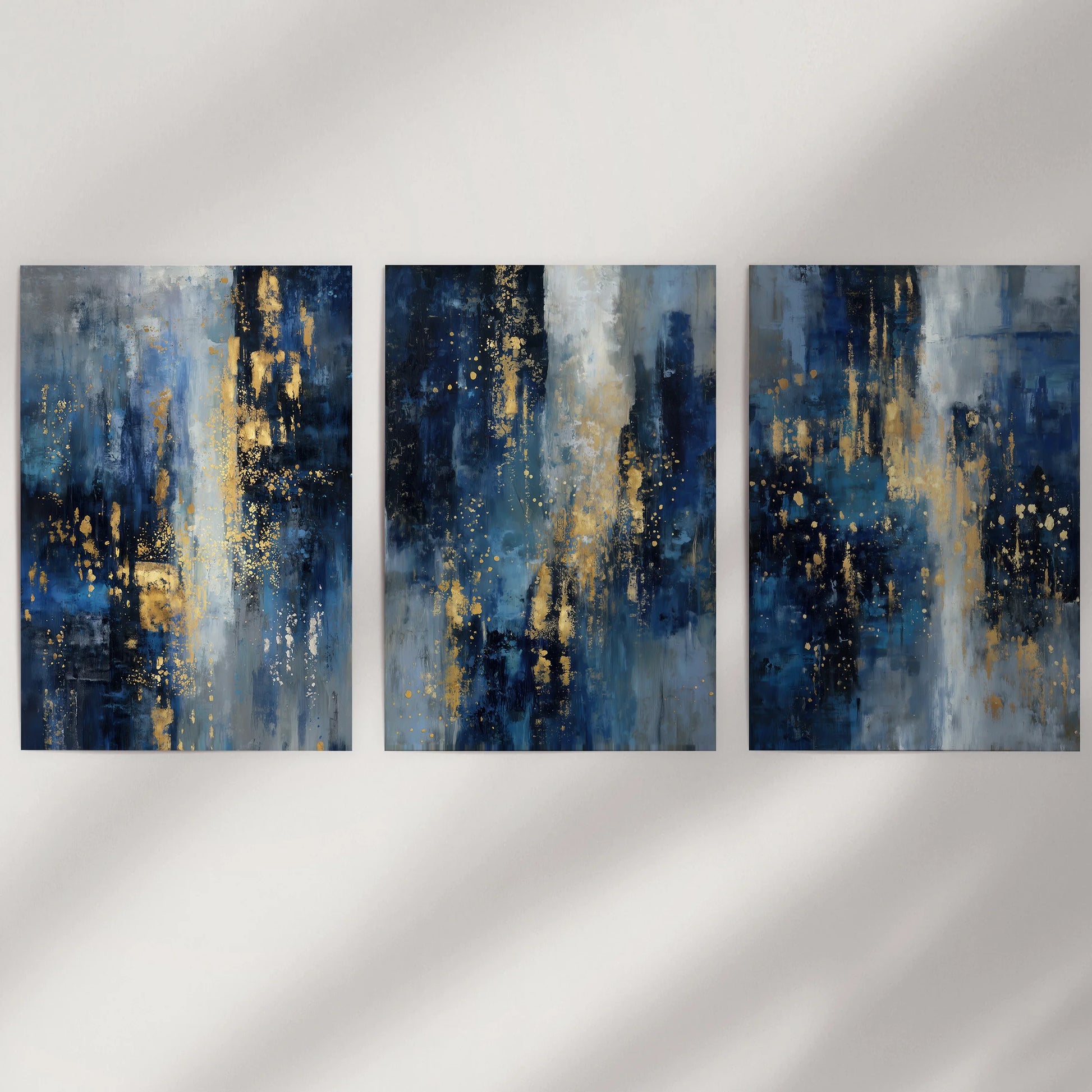 Minimalist blue and gold composition, set of 3 unframed art prints, rolled in a tube for easy hanging on a clean wall.