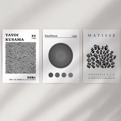 Minimal black-and-white abstracts, set of three, cleanly fill a bare wall space as art prints with a frame-free finish for a crisp, modern display.