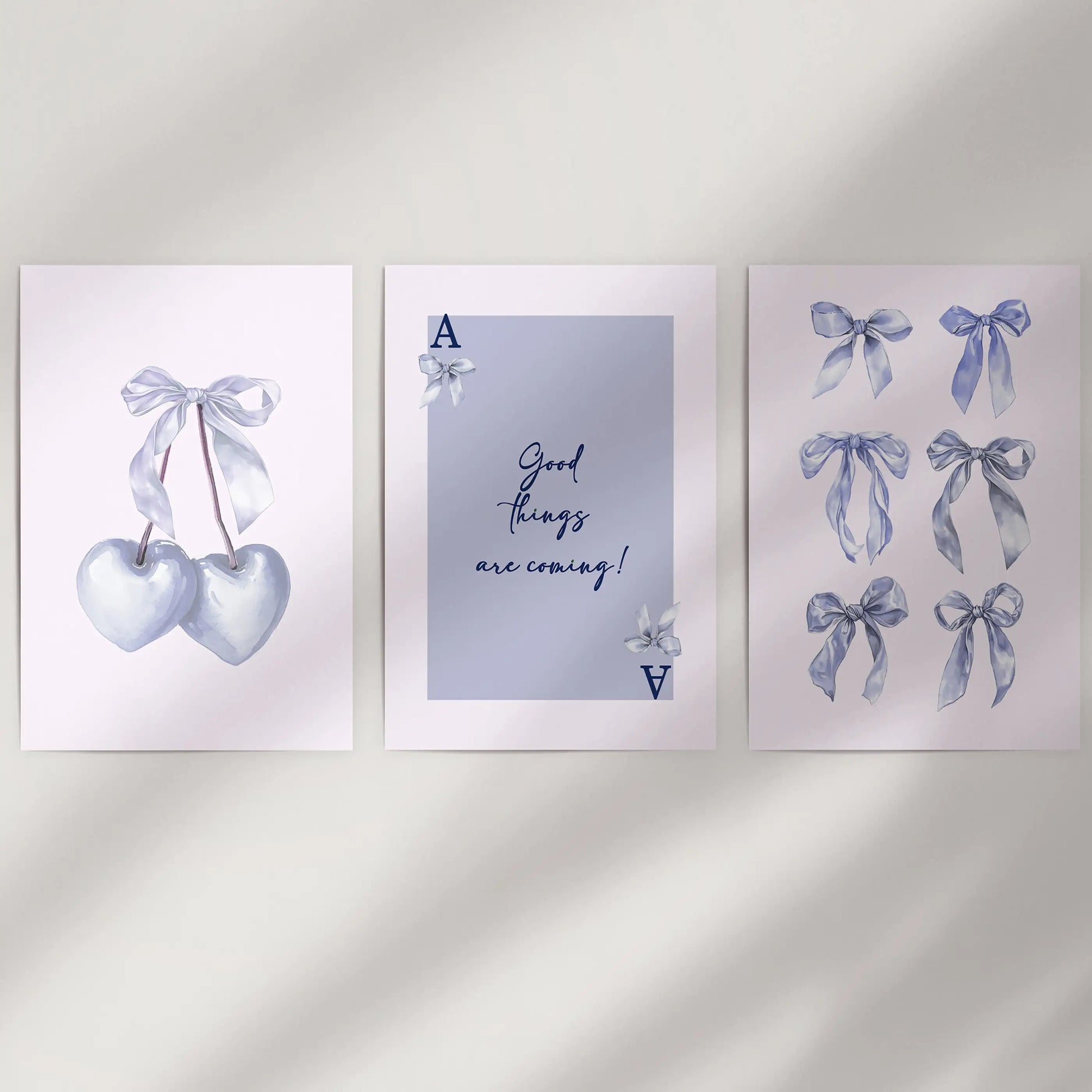 Light blue bow aesthetic posters, 3-piece collection, arrive frame-free to refresh a blank wall with a delicate coquette vibe and softly balanced spacing.