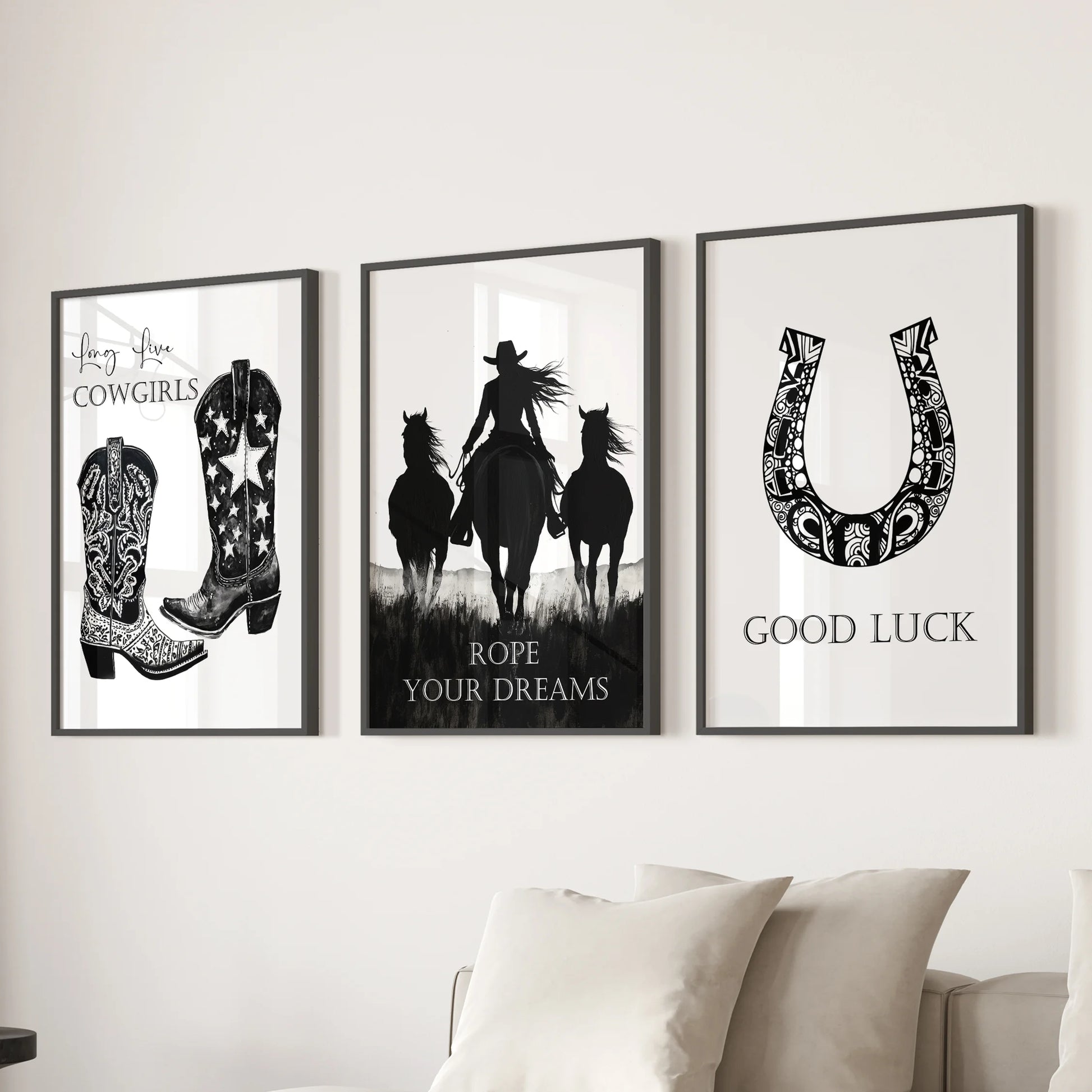 Horseshoe good-luck prints, a set of three wall art pieces, come in sleek black frames to anchor a lounge over the sectional sofa with Western flair.