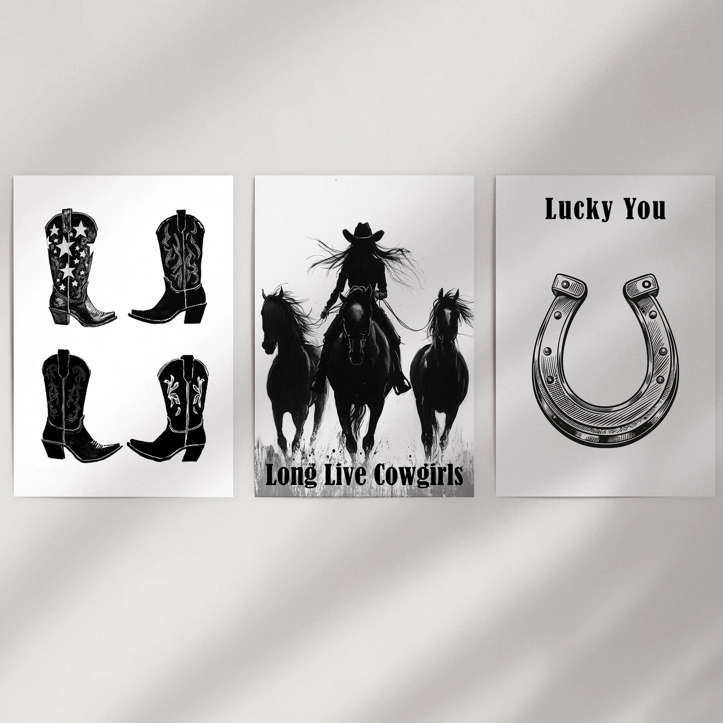 A trio of unframed Southwestern cowgirl prints gives a clean wall flexible style, easy to mix or rearrange across Western interiors.