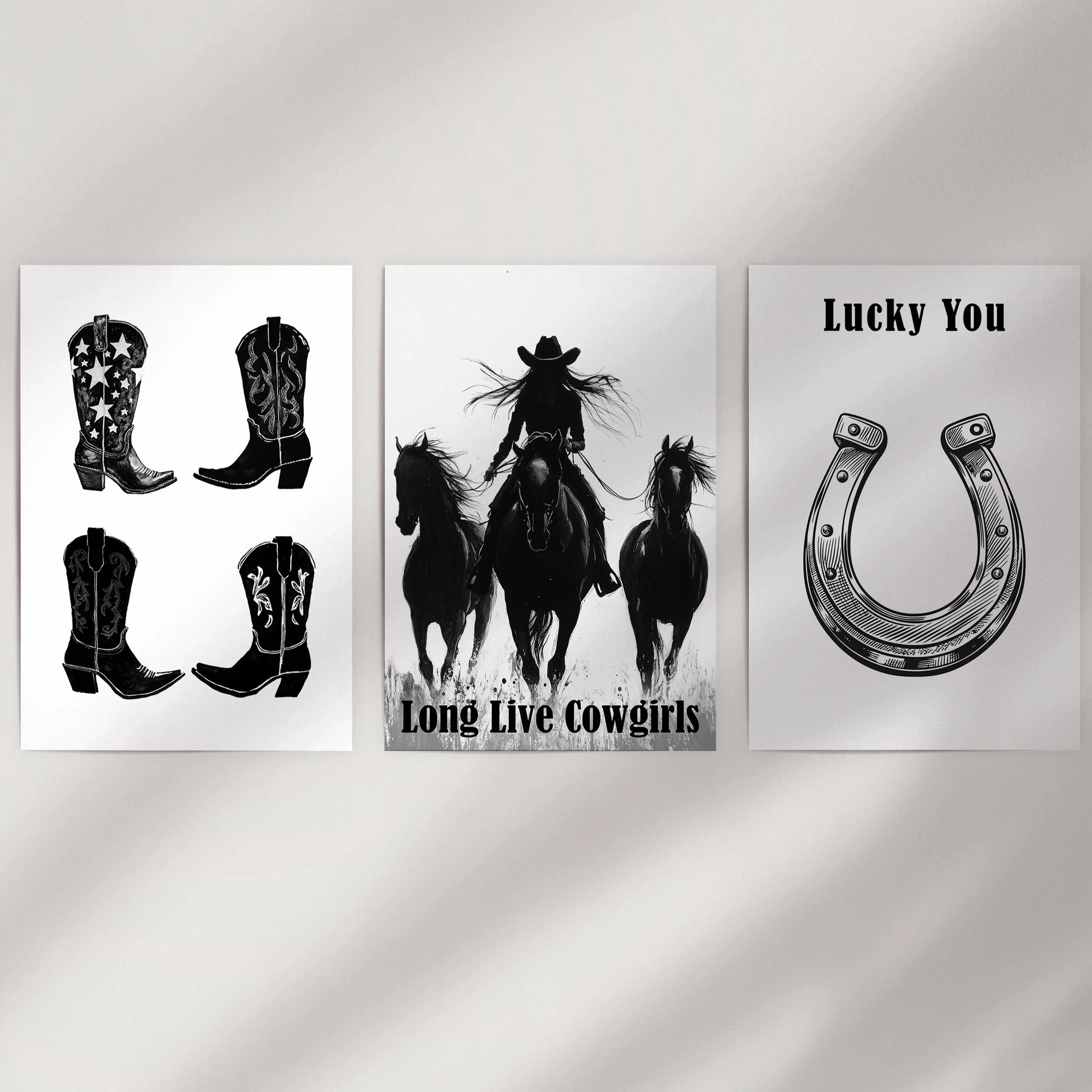 A trio of unframed Southwestern cowgirl prints gives a clean wall flexible style, easy to mix or rearrange across Western interiors.