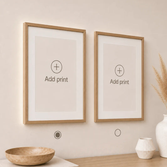 Two natural oak picture frames showing an interactive wall art builder for creating a custom matching gallery wall.