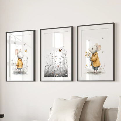 A gallery wall of three mouse watercolor prints in black frames with wide mats adds a gentle touch above the couch in a cozy sitting room.