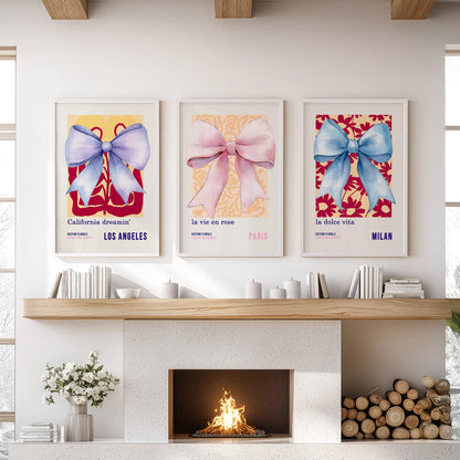 Pastel ribbon bows, a 3-piece gallery wall in white frames, crown the sitting room above the fireplace mantel with soft, coquette charm.