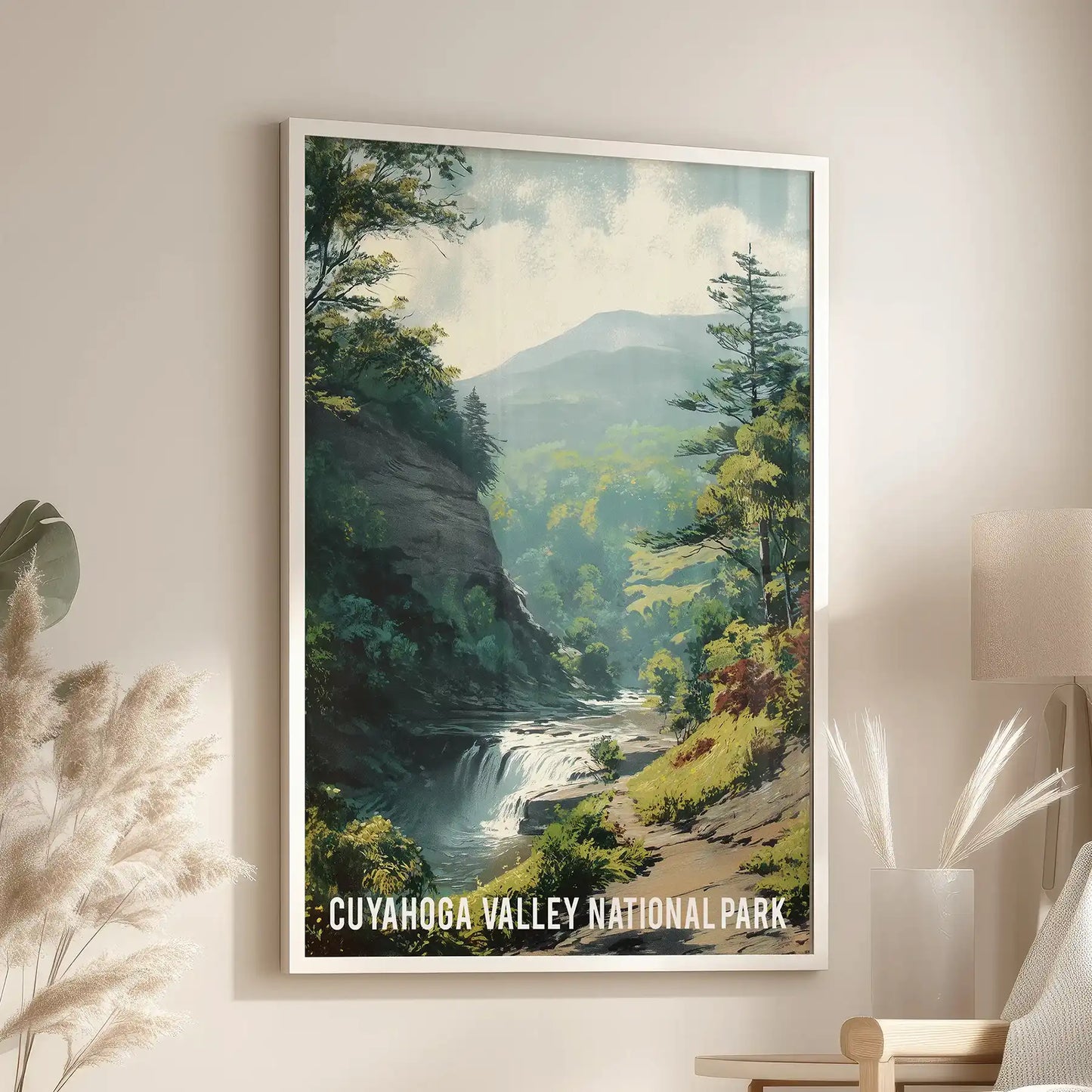 Cuyahoga Valley travel wall art, a single print set in a white frame, hangs over an armchair in the lounge, bringing serene woods and river light.
