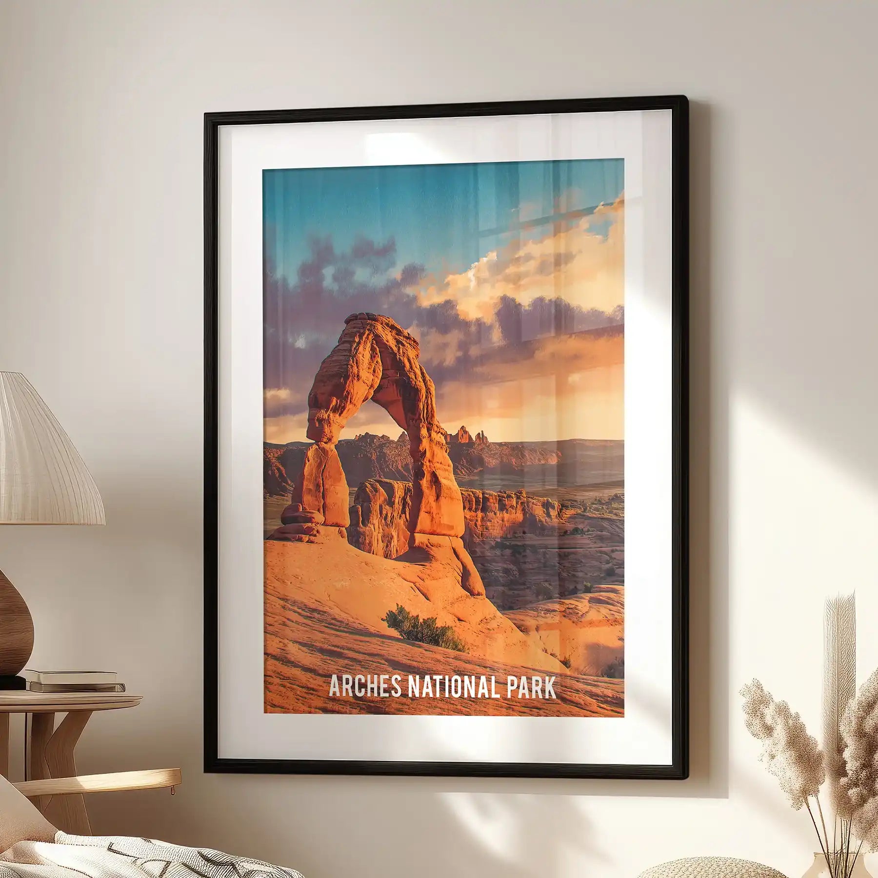 Sandstone arches one-panel wall art print suits the family room, set in a black frame with a white mat and poised over a lounge chair for easy impact.