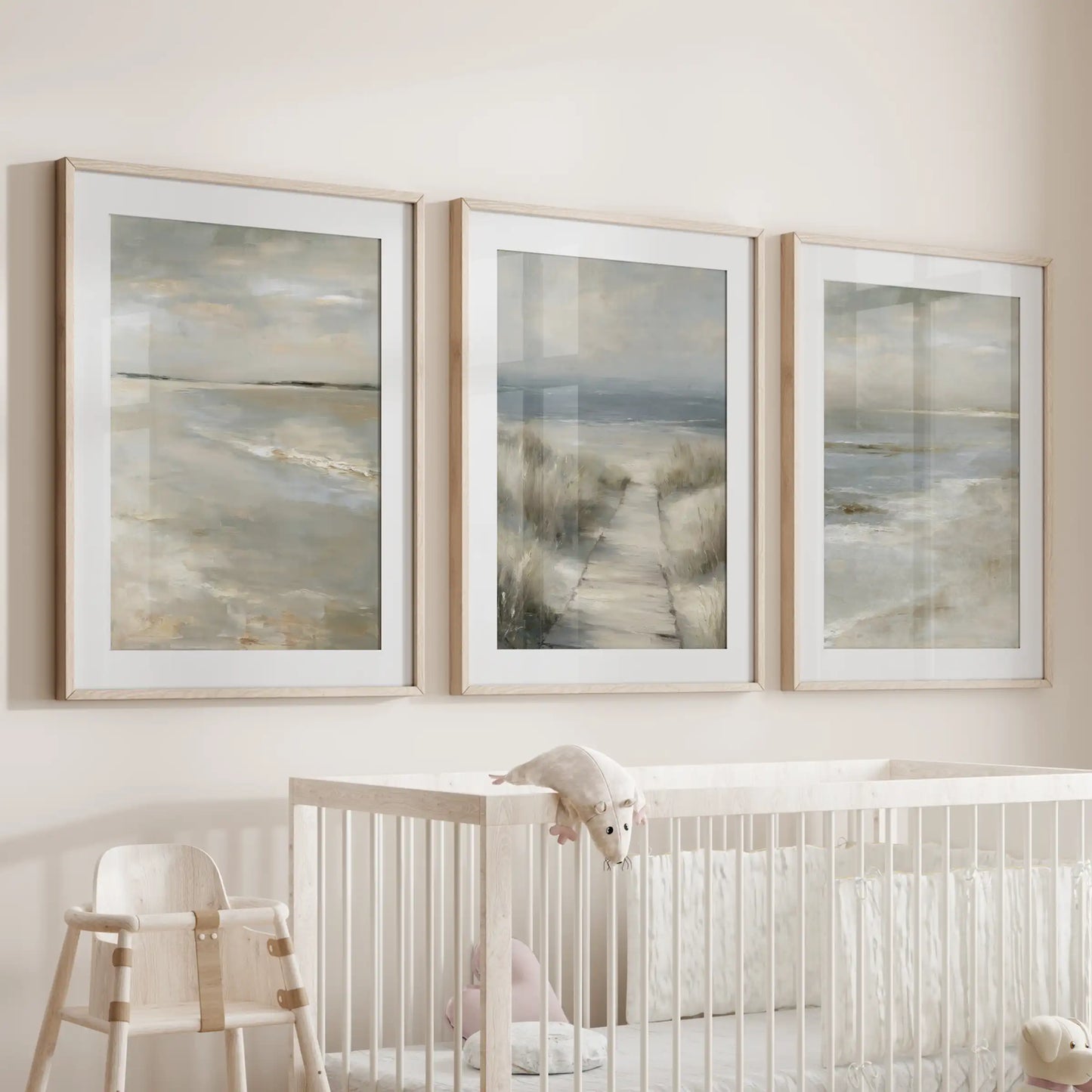 Beach path through dunes three-piece wall art in natural wood frames with mats hangs over the cot, softly grounding the infant room.