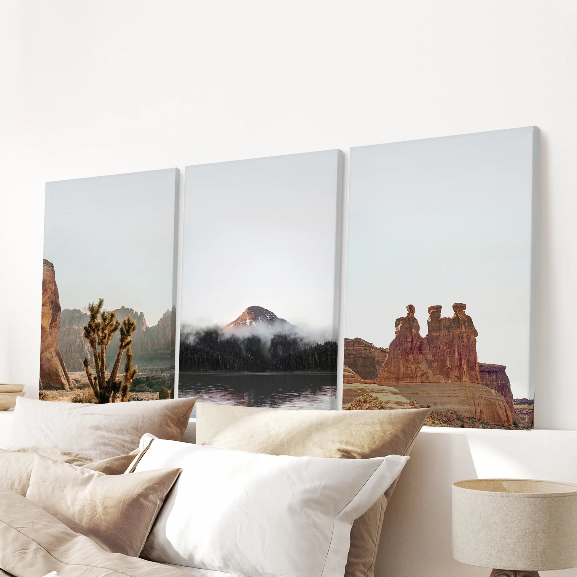 Utah canyon vistas poster set of three on unframed canvas creates a soft, earthy focal point above the bedroom headboard.