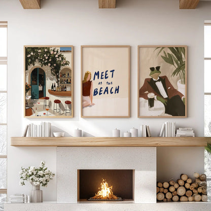 Wine bar prints, a set of three in oak frames, anchor the family room above the hearth with rich bottle tones and vintage flair.