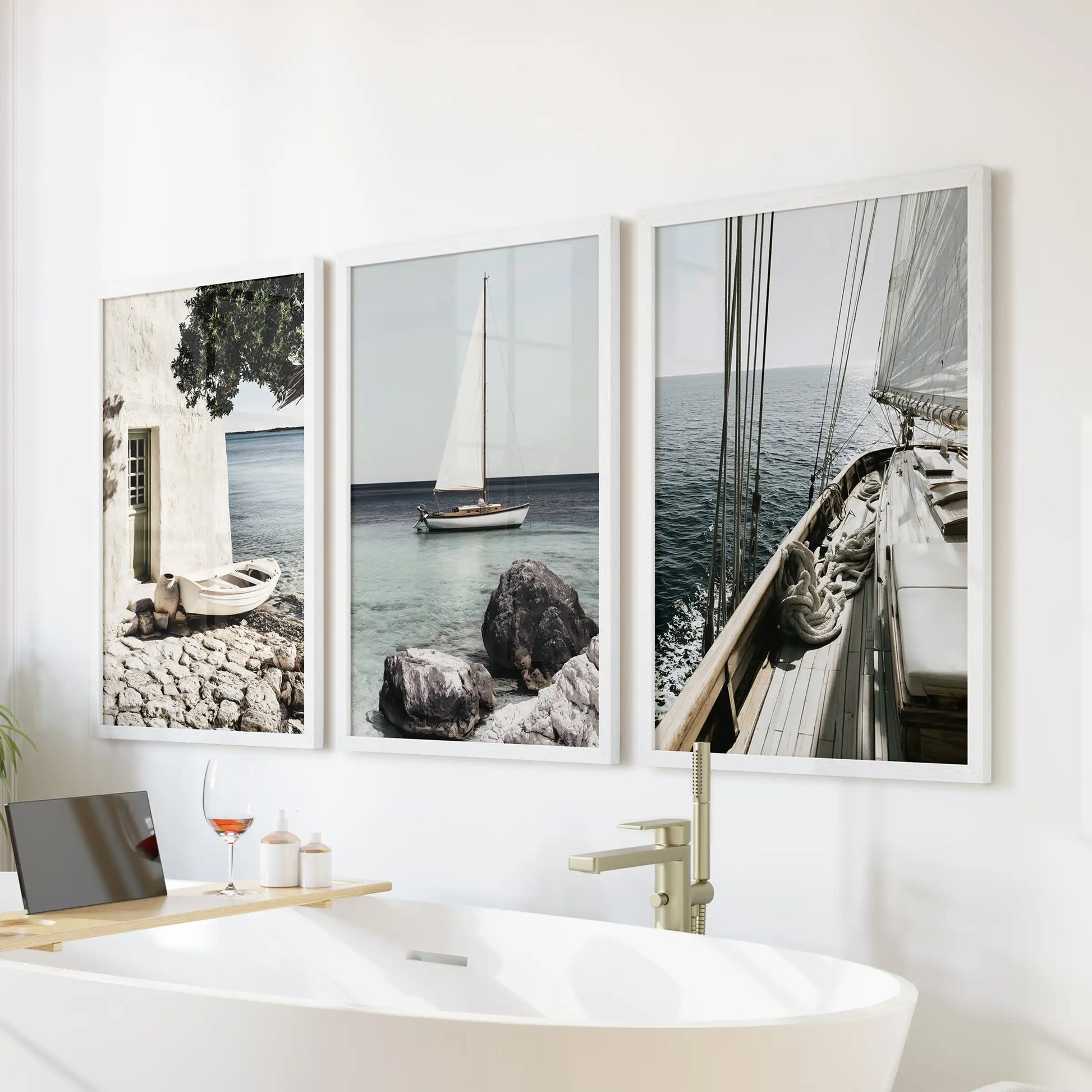European seaside village art, 3 piece wall art, comes in white frames and hangs above the soaking tub, lending spa-calm coastal texture to the bathroom.
