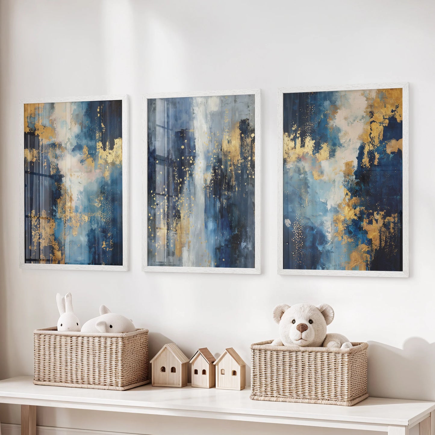A 3-piece white-framed wall print set in navy and gold hangs above the toy organizer, refreshing the kids’ playroom with clean, graphic calm.