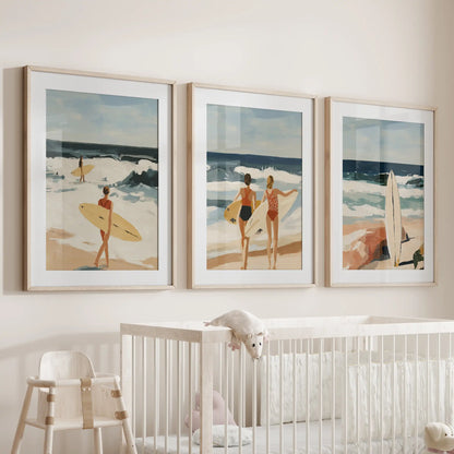 Surfer girl wall art set of 3 decor, in wooden frames with matting, settles gently above the bassinet to give an infant room a calm ocean whisper.