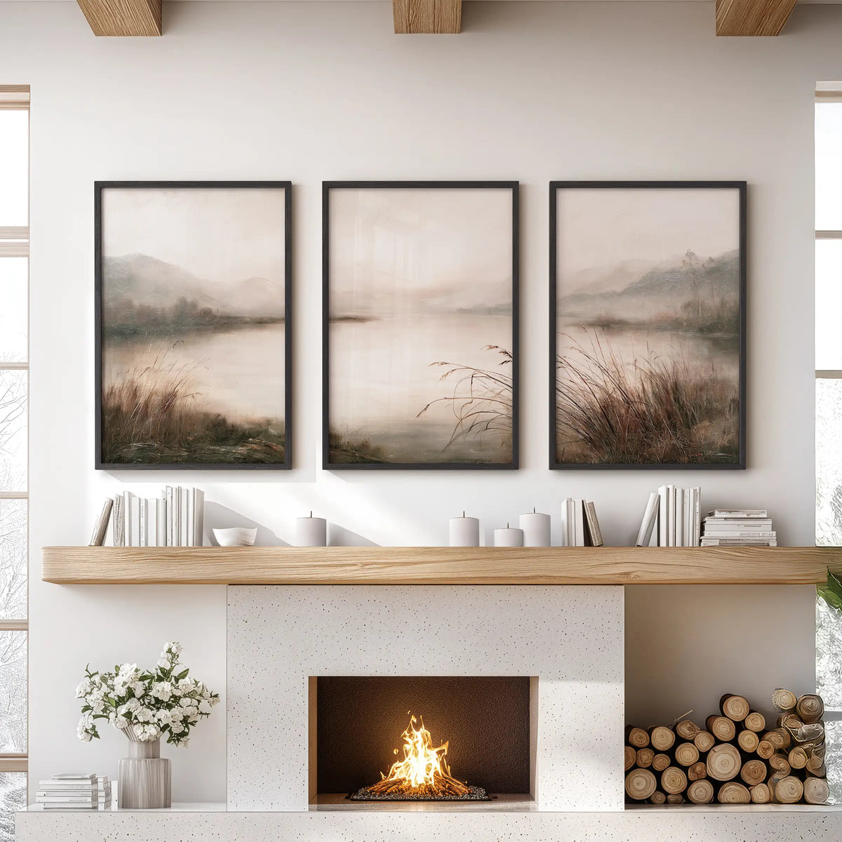 Foggy woodland lake 3-print gallery wall in black frames, displayed above the fireplace in a family room with a sofa and built-in shelves.