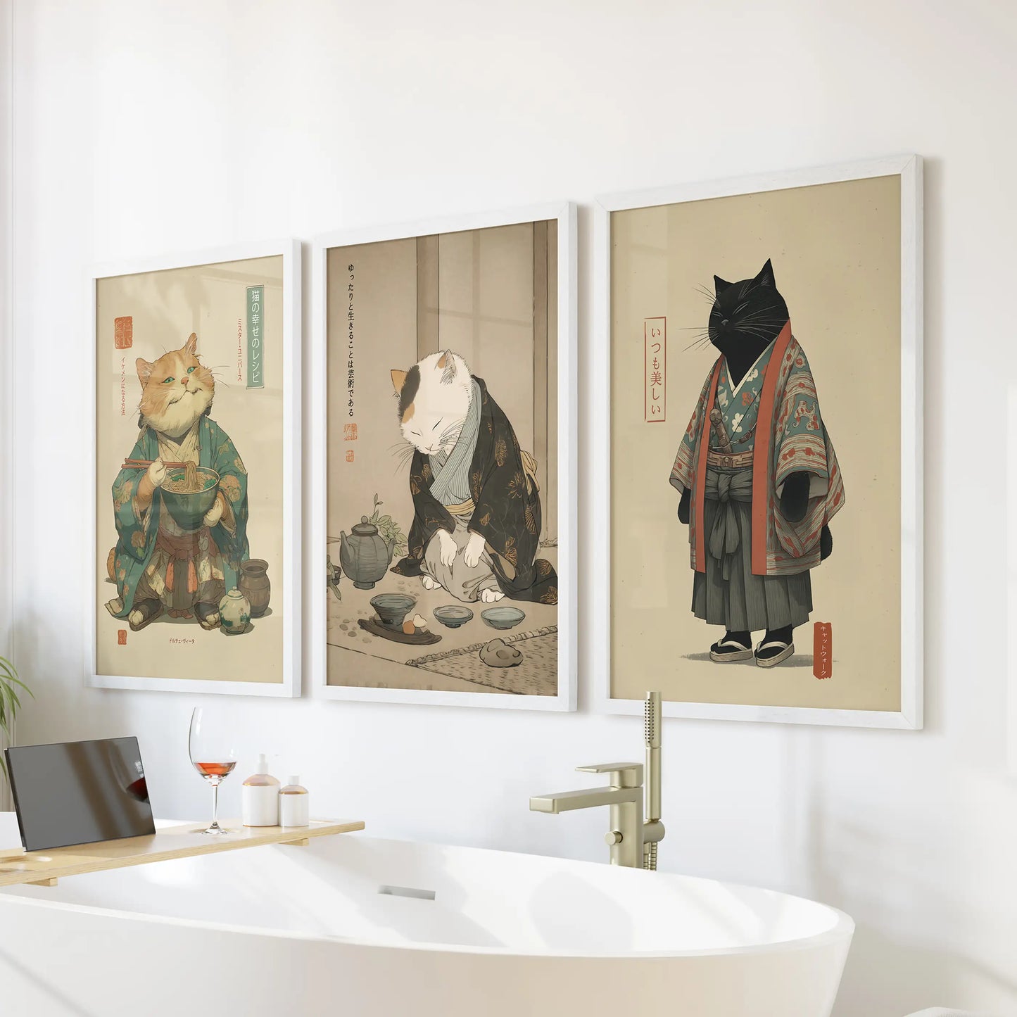Three white-framed bathroom prints show a Japanese tea-ceremony cat poised above the tub, playful yet serene in its ritual theme.