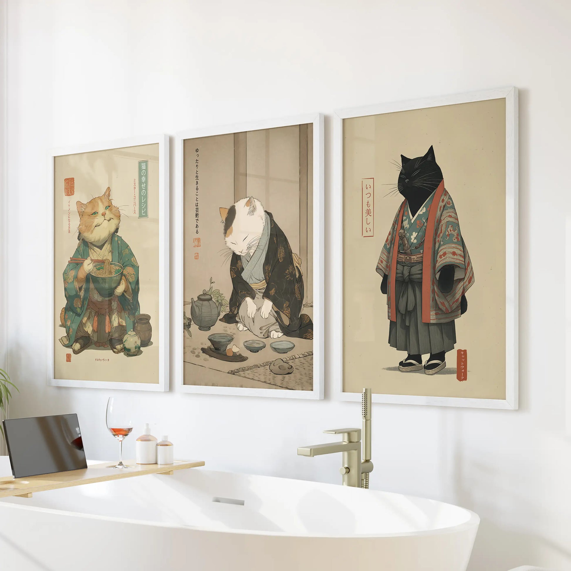 Three white-framed bathroom prints show a Japanese tea-ceremony cat poised above the tub, playful yet serene in its ritual theme.