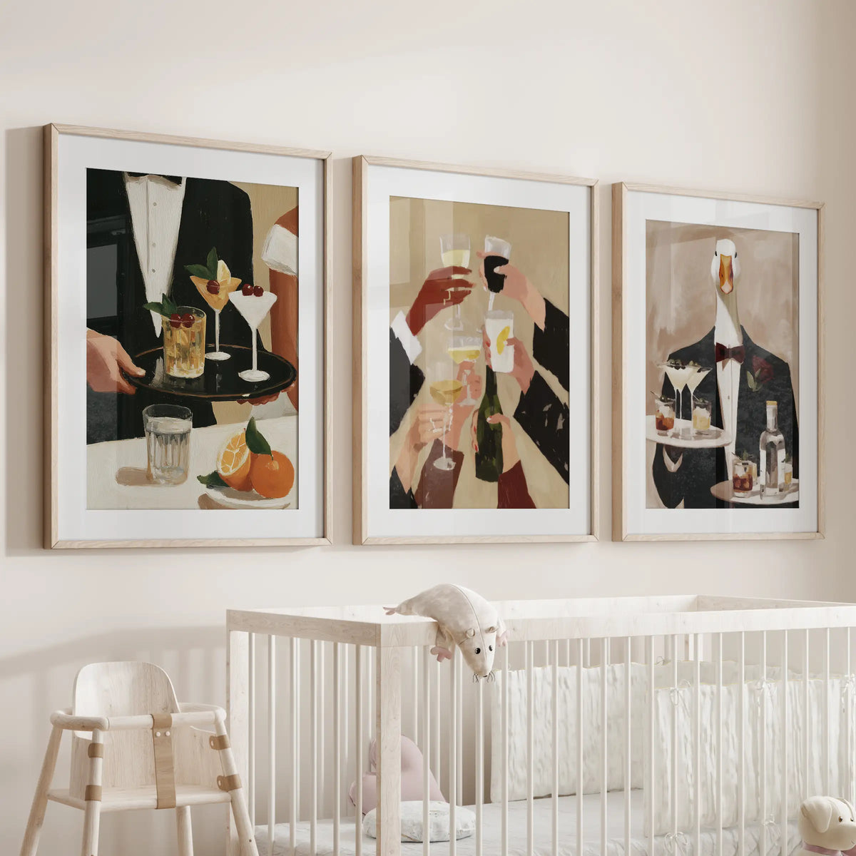 Goose bartender wall art in a 3-piece set, hung above the nursery crib in natural wood frames with mats.