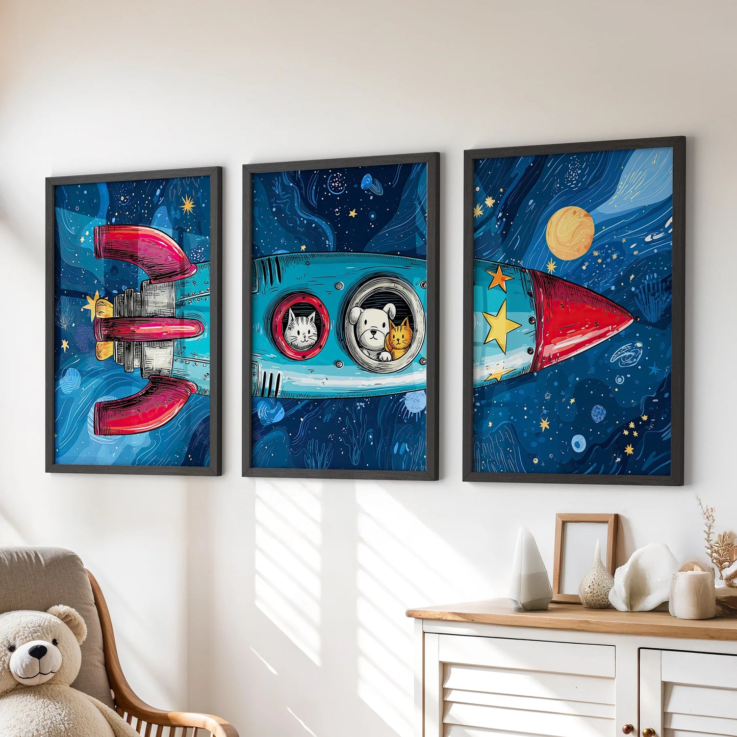Three framed outer space prints of planets and stars brighten a child’s room, neatly arranged above the dresser in crisp black frames.