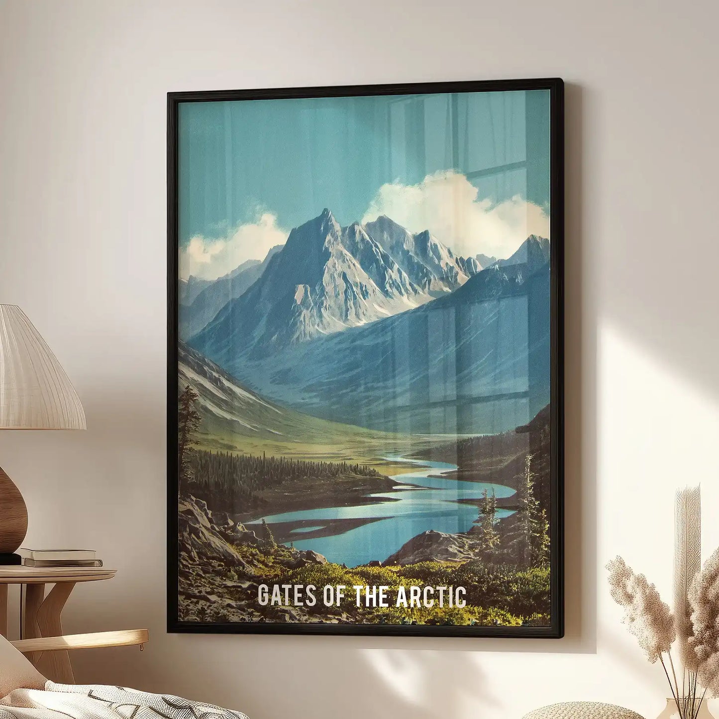 Gates of the Arctic National Park statement wall art in a black frame grounds the living room, hanging above the window-side chair with cool northern tones.