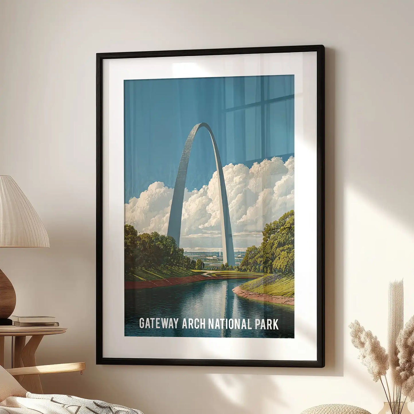 St. Louis cityscape individual poster wall art in a black frame with a wide mat, styled for the family room over an accent chair.