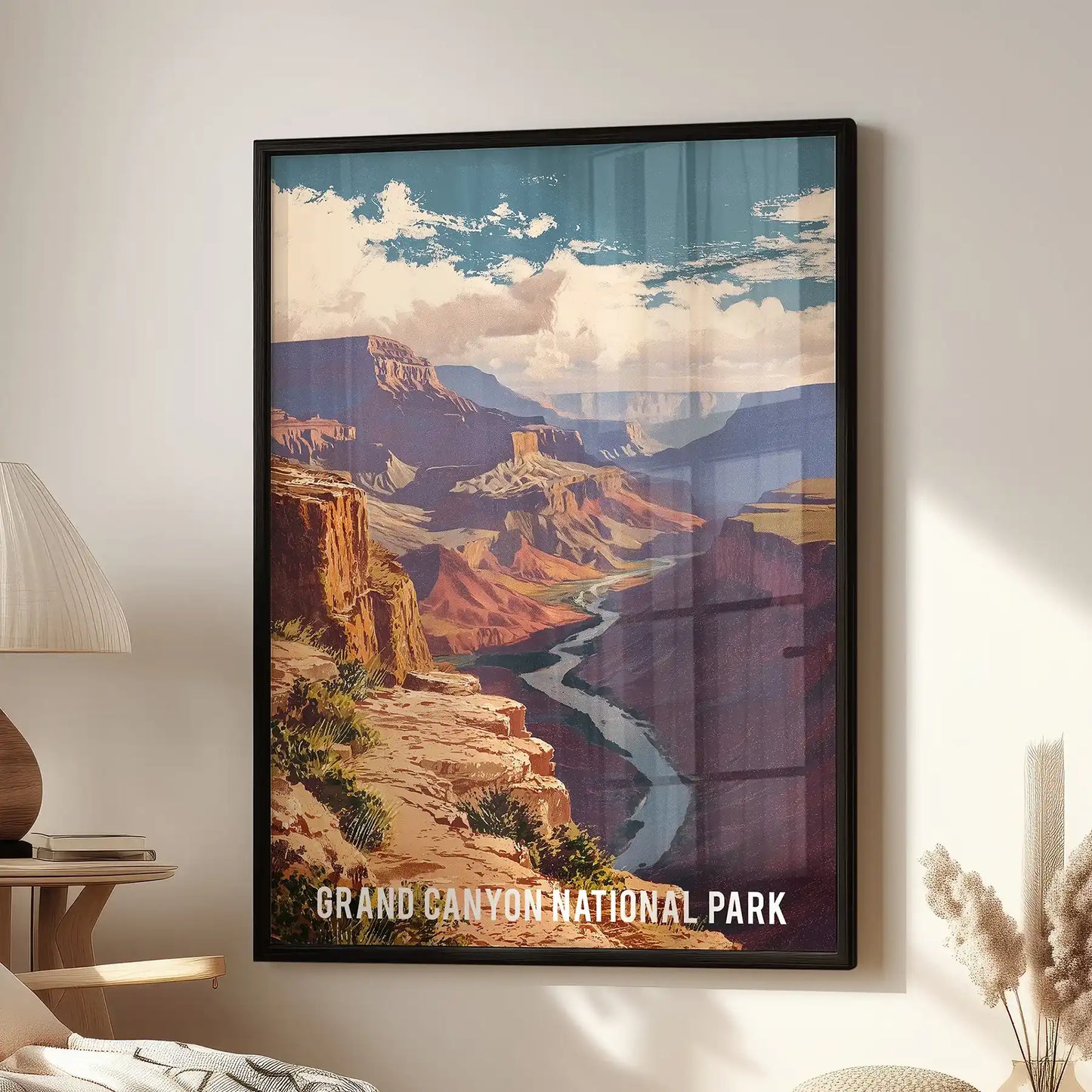 Grand Canyon landscape large poster print in a black frame, styled for a family room and set above the reading chair with sunlit terracotta cliffs.