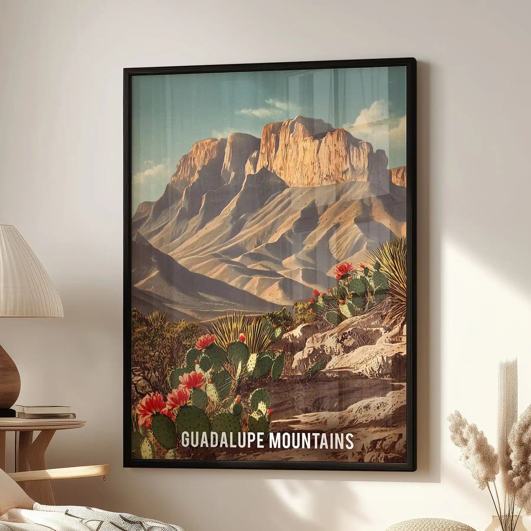 Guadalupe Mountains National Park artwork print in a black frame, hung over the seating area of the sitting room, brings rugged Texas desert peaks and sky to the wall.