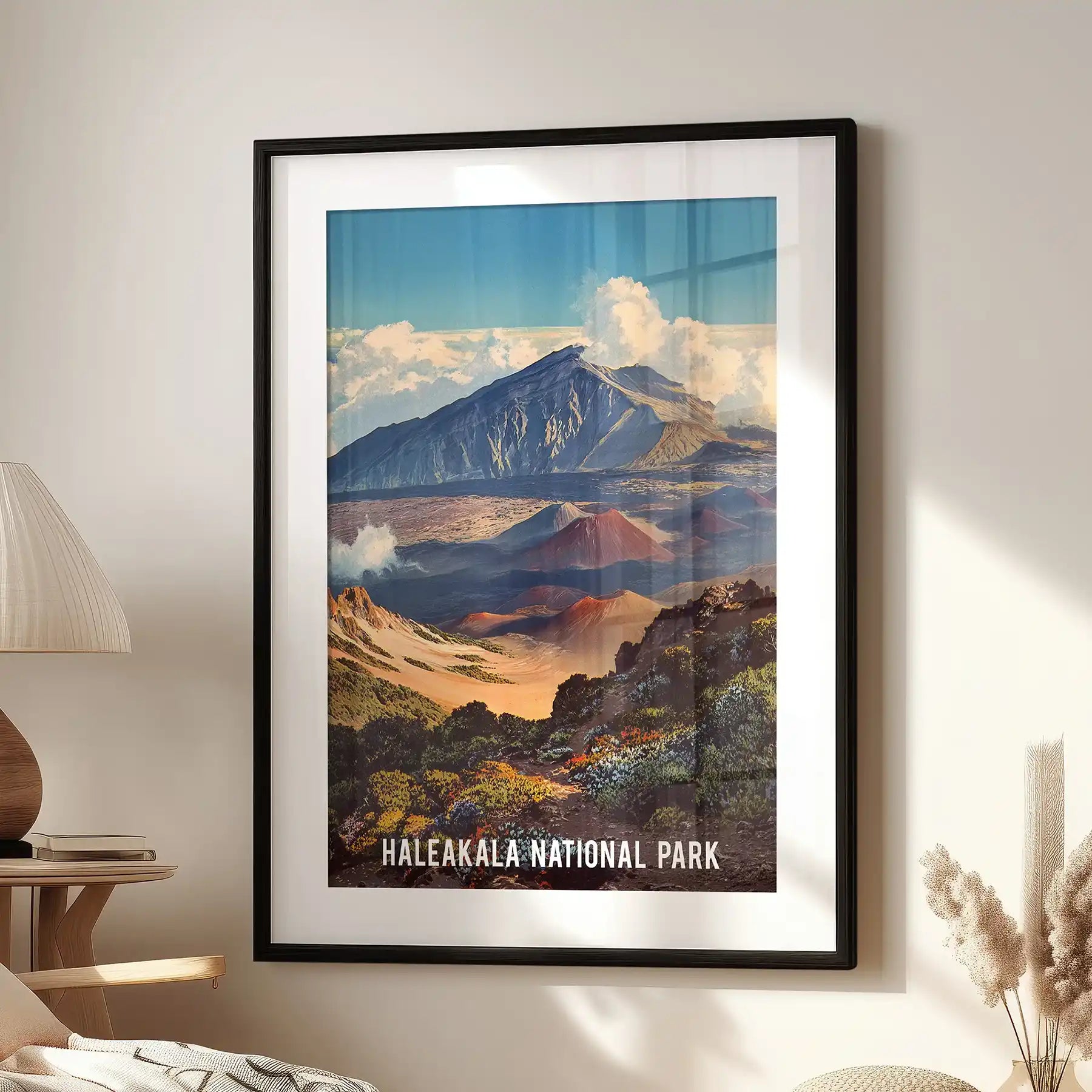 Maui volcano crater single artwork brings a rugged sense of place to the lounge, set by the accent chair in a black frame with matting for a crisp gallery look.