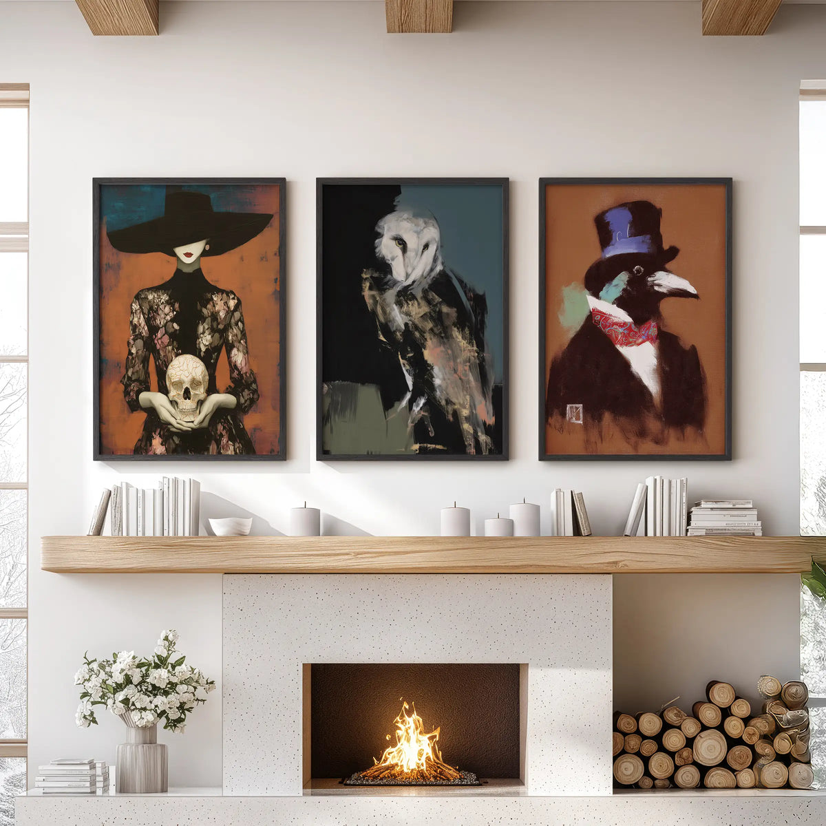 Occult imagery set of three framed artworks in black frames, arranged over the hearth in a family room and featuring an owl, skull and raven.