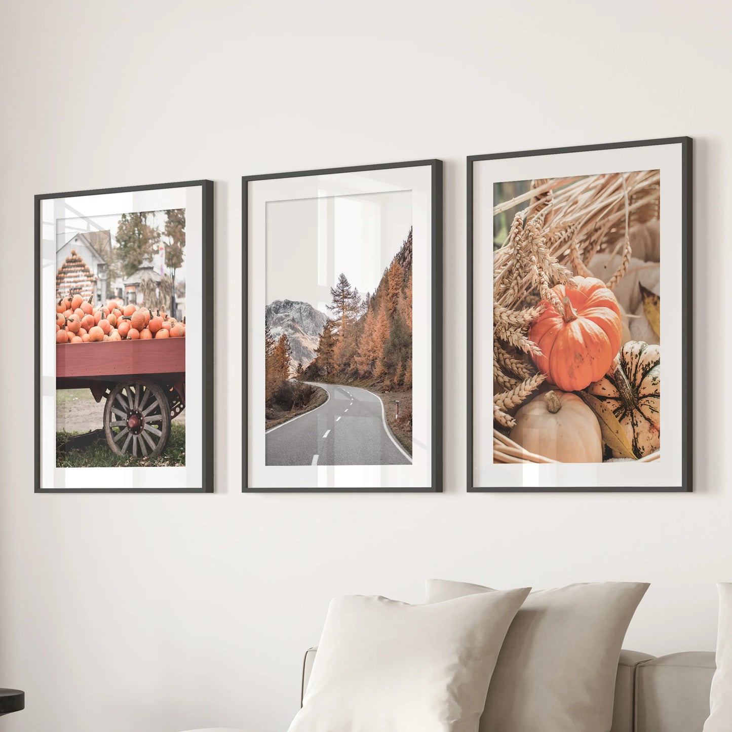 Harvest fields in autumn three-piece wall art set, black frames with matting hung above the lounge sofa, lends a grounded, seasonal calm to the space.
