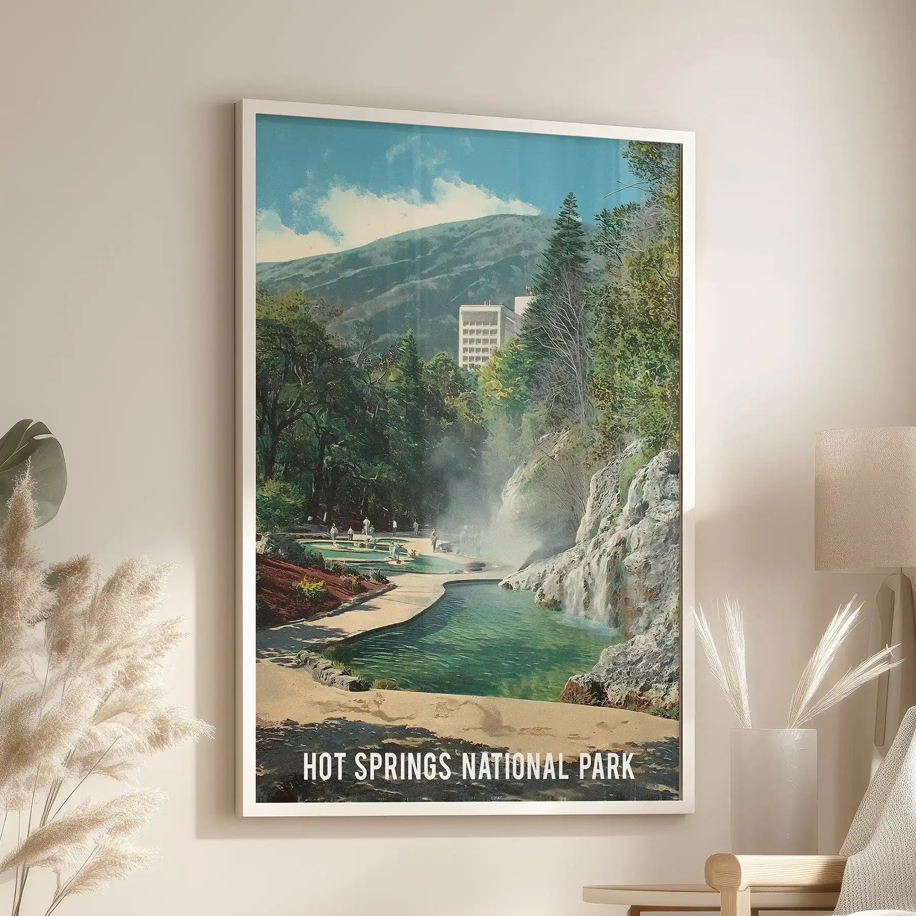 Large bathhouse row wall poster in a white frame fills the living room above the lounge seat with calm spa-day energy.