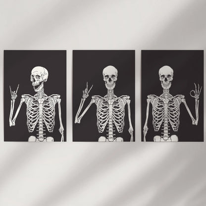 This witty wall art set of three skeleton prints appears clean and modern on a white wall, adding a crisp, playful Halloween note.