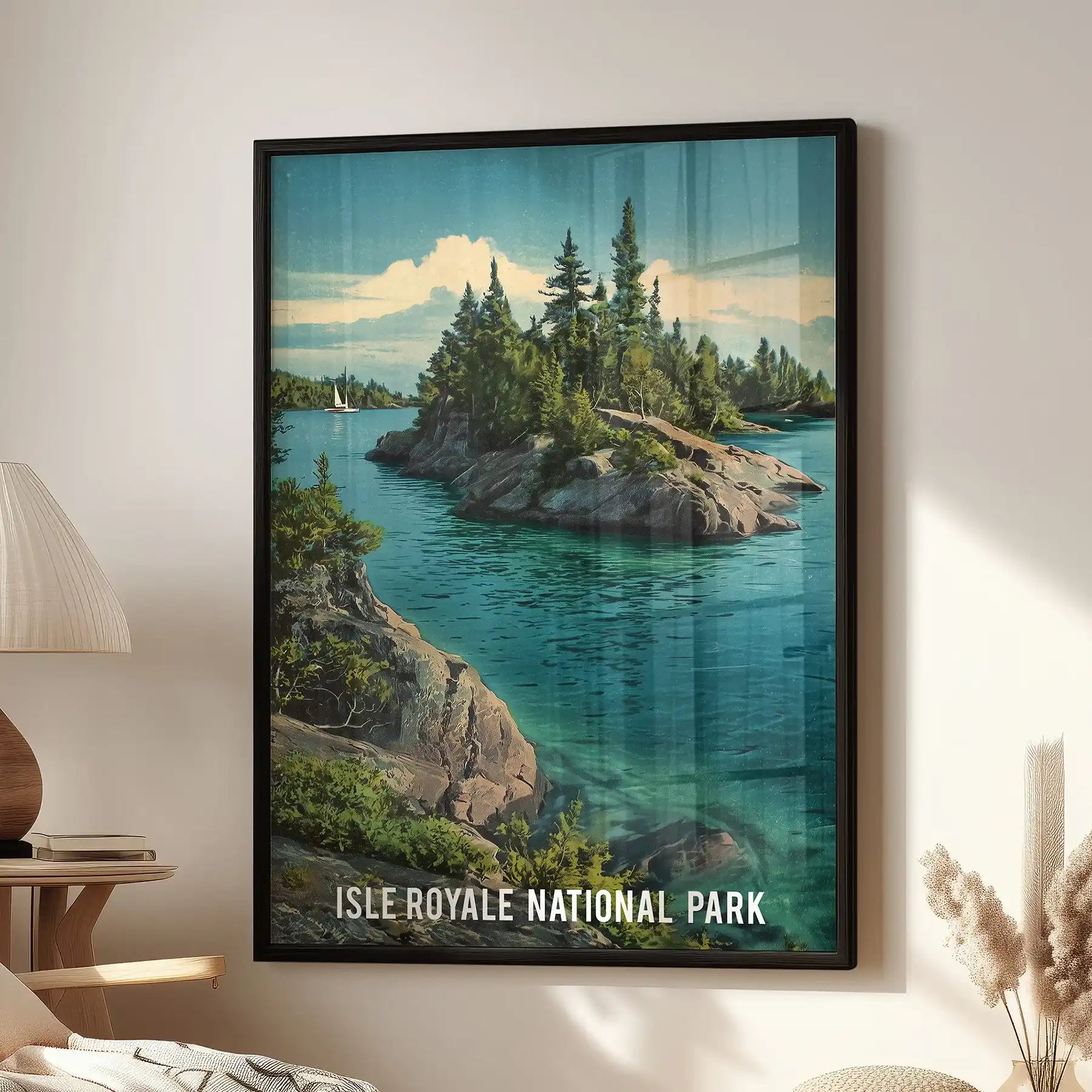 A black-framed wall print of a deep teal forest lake adds calm northern scenery beside a window chair in a modern lounge.