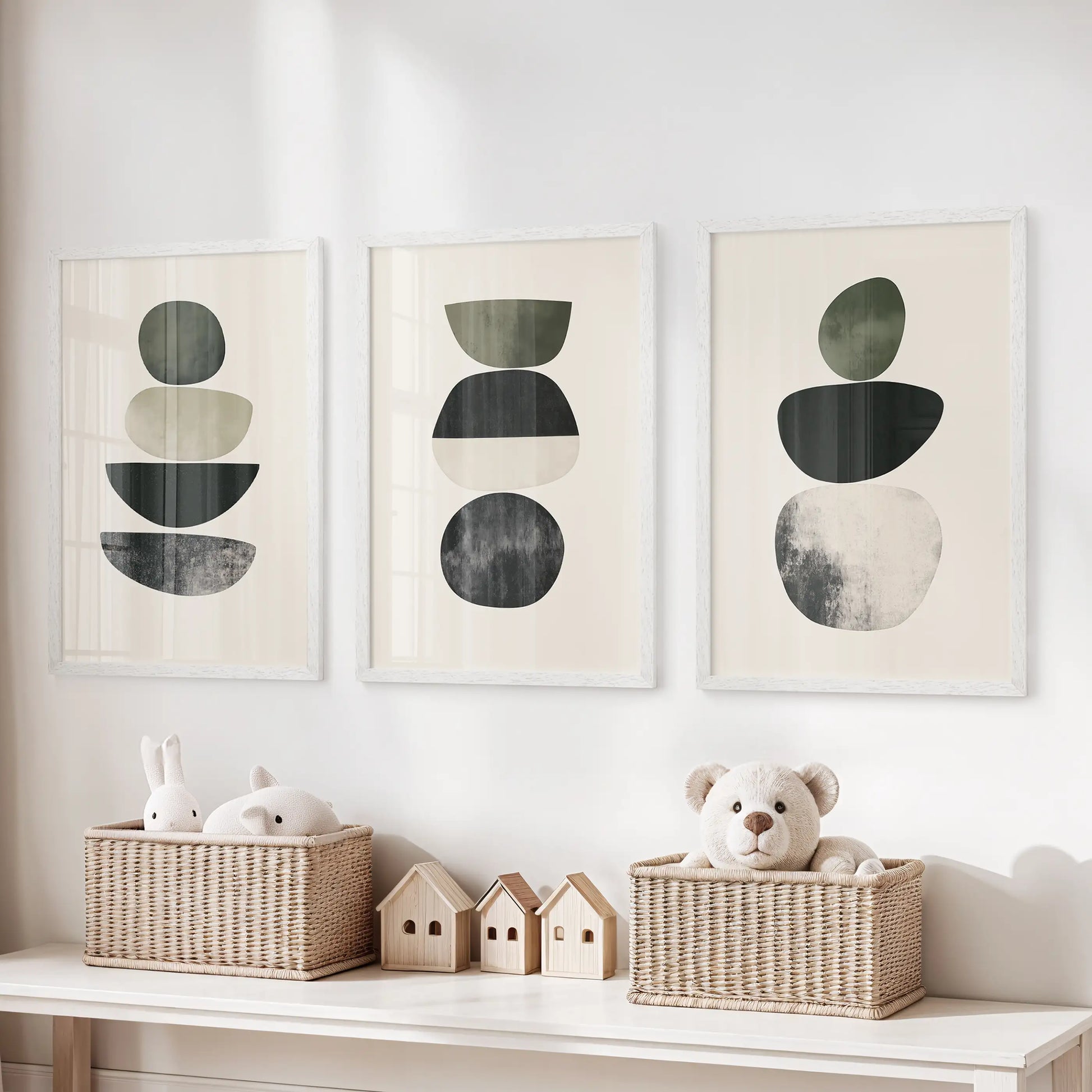 Japandi minimalist shapes set of 3 framed prints lends gentle wall art to a kids room, hung over the storage bench in clean white frames.