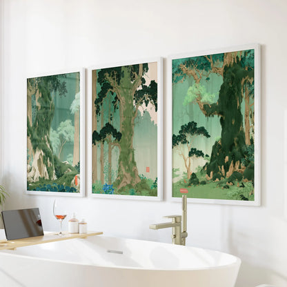 Japanese nature landscape wall art, a three-piece set in white frames, hangs in the bathroom over a freestanding tub.
