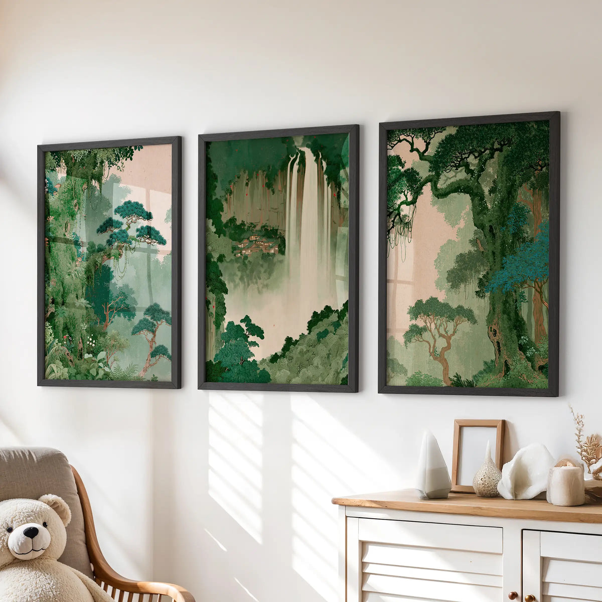 Japanese tree wall art set of three black-framed prints, displayed above a dresser in a kids' room.