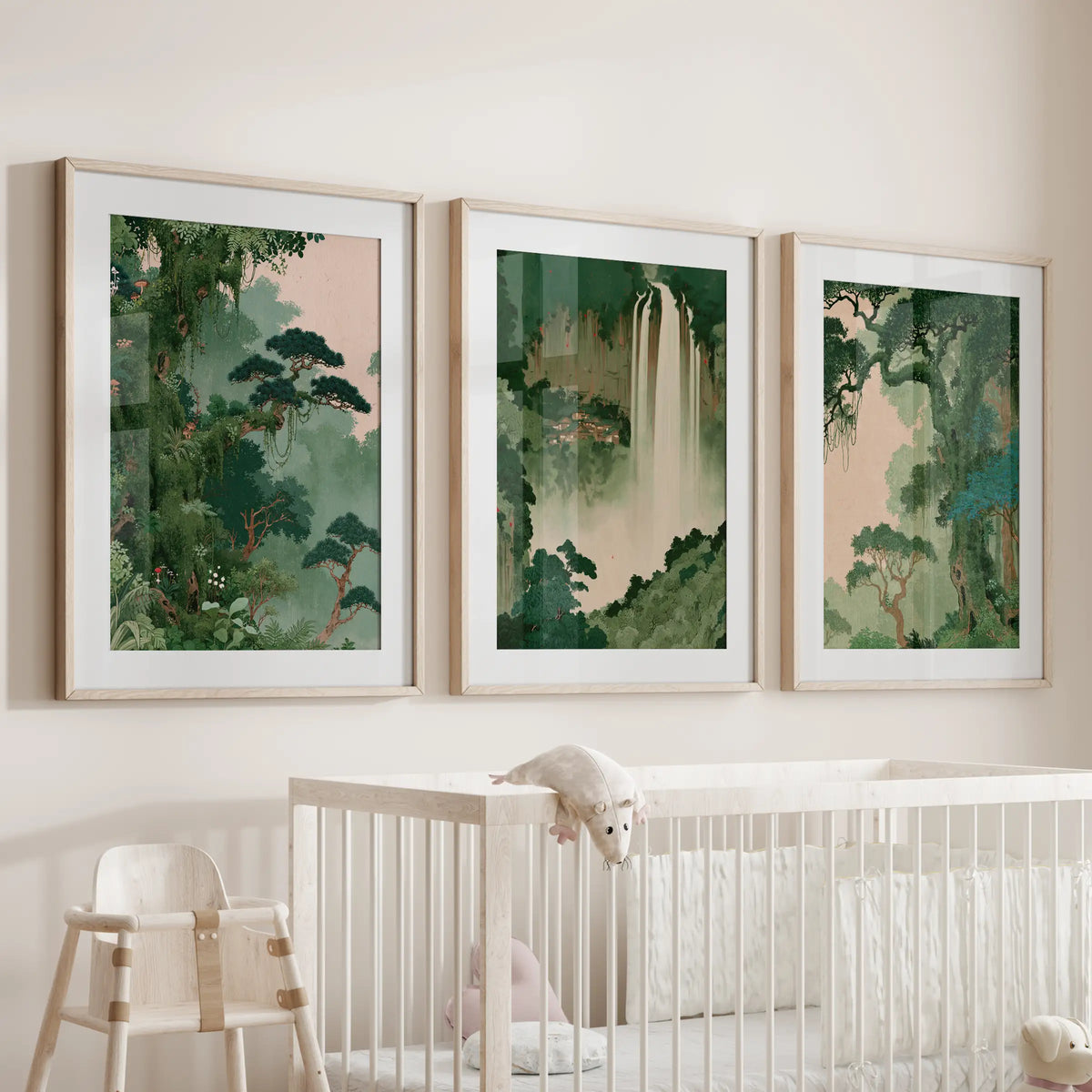 Japanese forest landscape wall art set of three large, wood-framed prints with mats, displayed over a bassinet in a baby nursery.