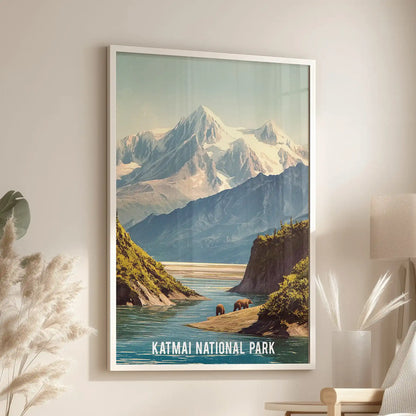 White-framed poster art of glacier peaks stands beside an accent chair in the sitting room, catching Katmai’s icy light and high summits.