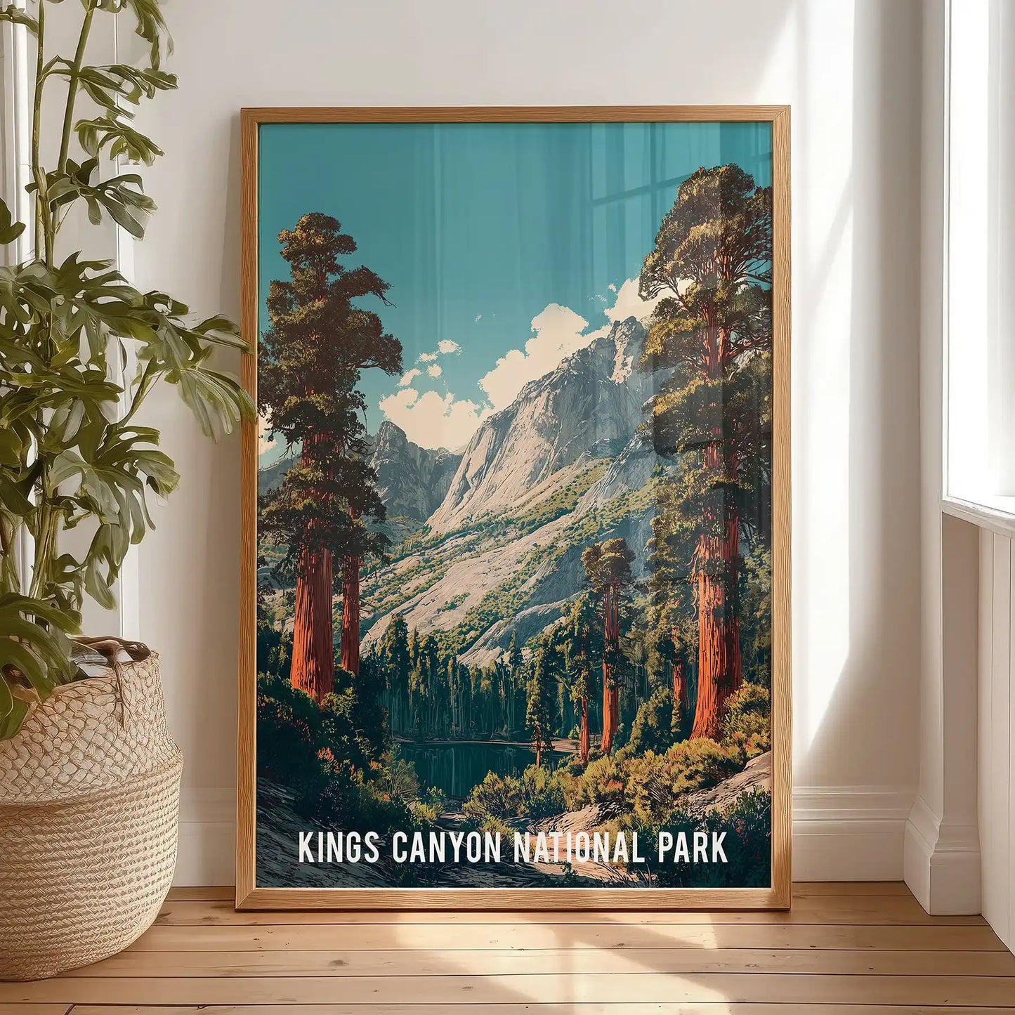 Sierra Nevada mountains wall art in a light oak frame leans on the bedroom floor against the wall, a warm, natural accent ready to hang.