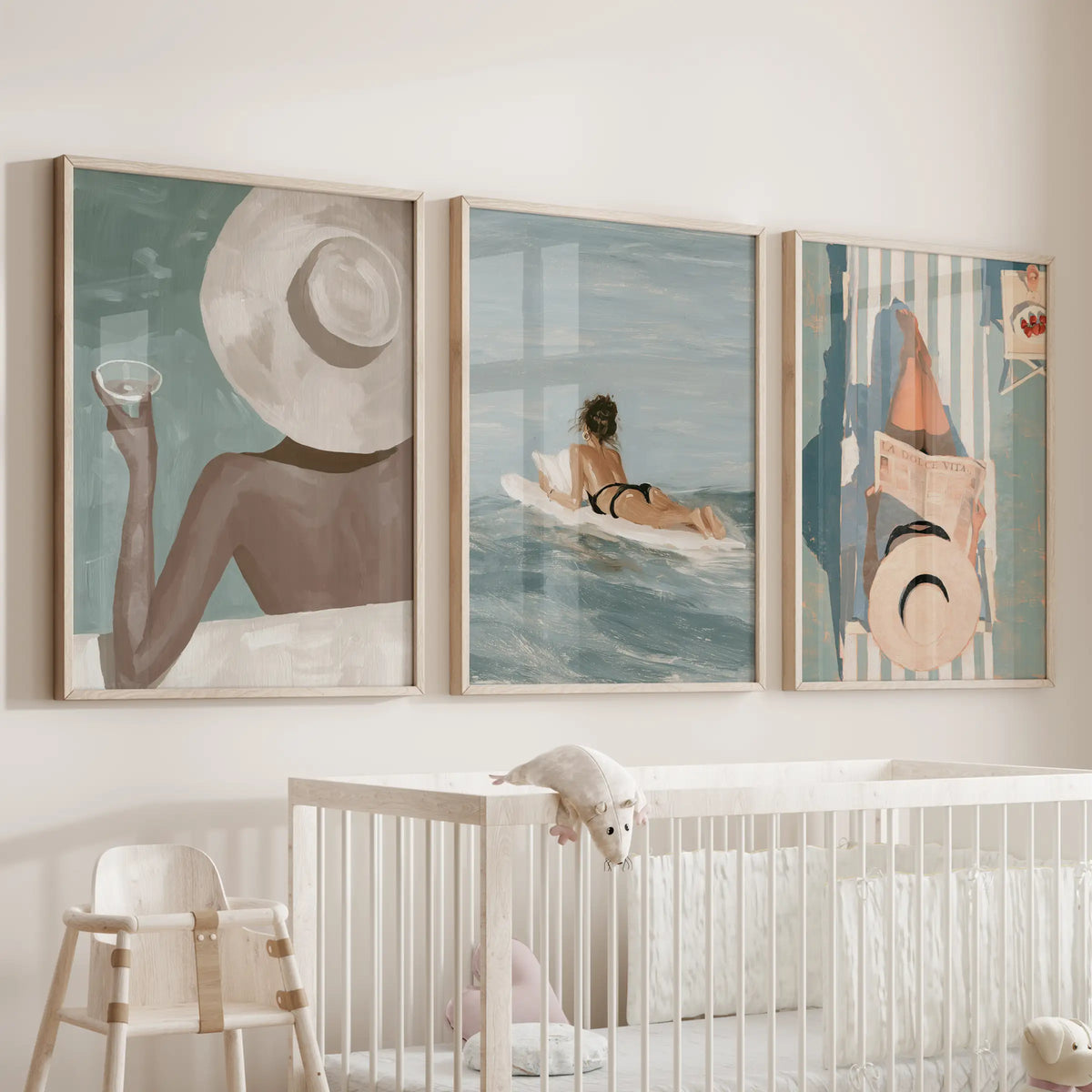 La Dolce Vita three-piece wall artwork hangs above a crib in an infant room, presented in solid oak frames.