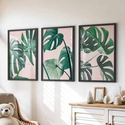 Monstera leaf close-ups three-print set, black framed wall art poised over the children’s room chest of drawers, adding soft tropical color without clutter.