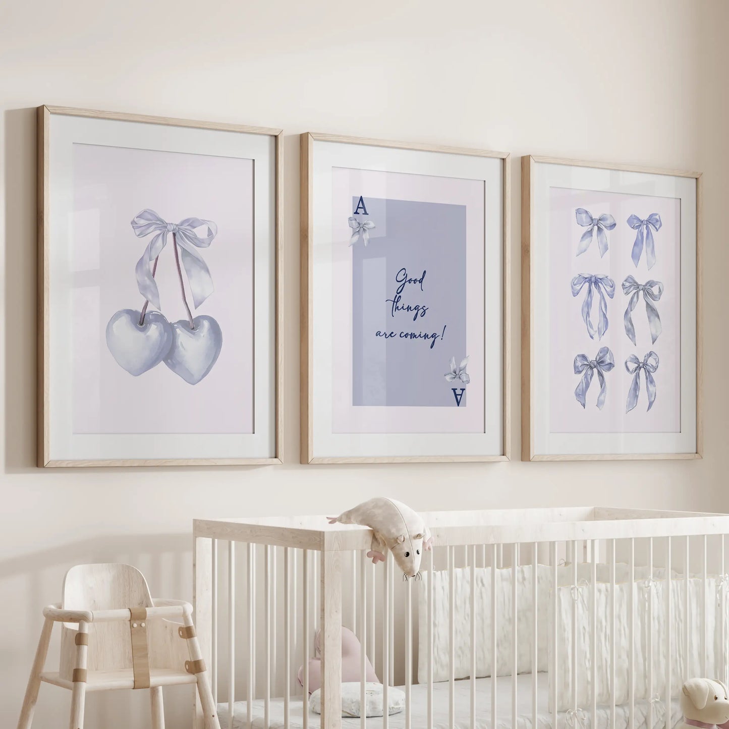 Good Things Are Coming quote prints, three-piece wall art set, rest in oak frames with mats above the cot, casting soothing optimism across the infant room.