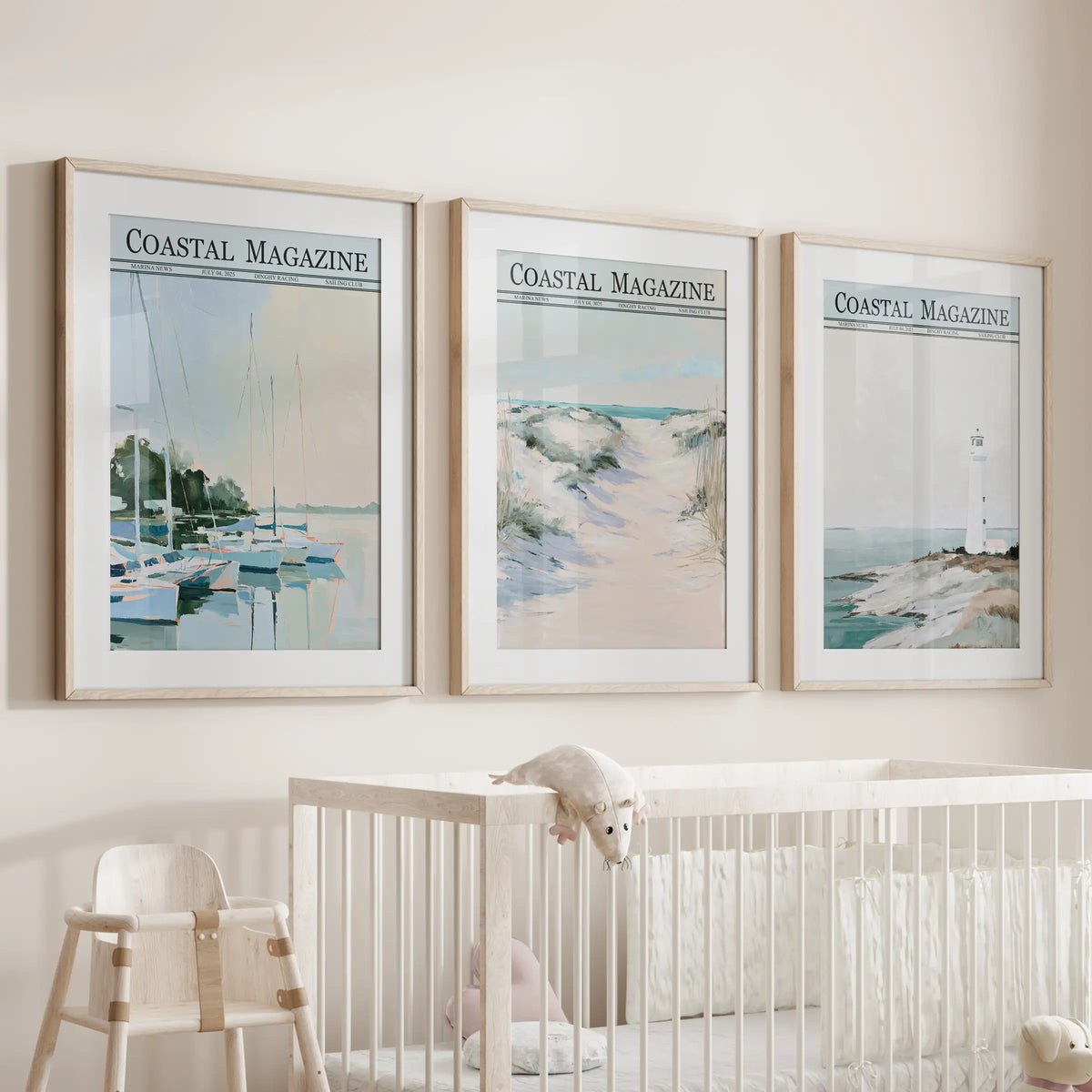 Lighthouse and beach 3-piece wall art set in thin wood frames with mats, displayed over a bassinet in a baby nursery.
