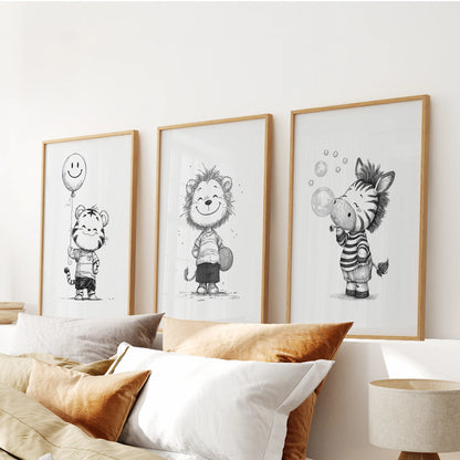 Black-and-white safari animals, a set of 3 artwork in light oak frames, mounted over the bedroom headboard to warm the wall art display.