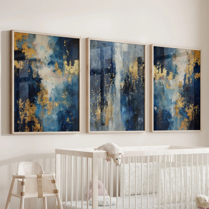 A 3-piece wood-framed picture set in modern navy abstracts decorates the wall above the crib, keeping the baby room calm and polished.