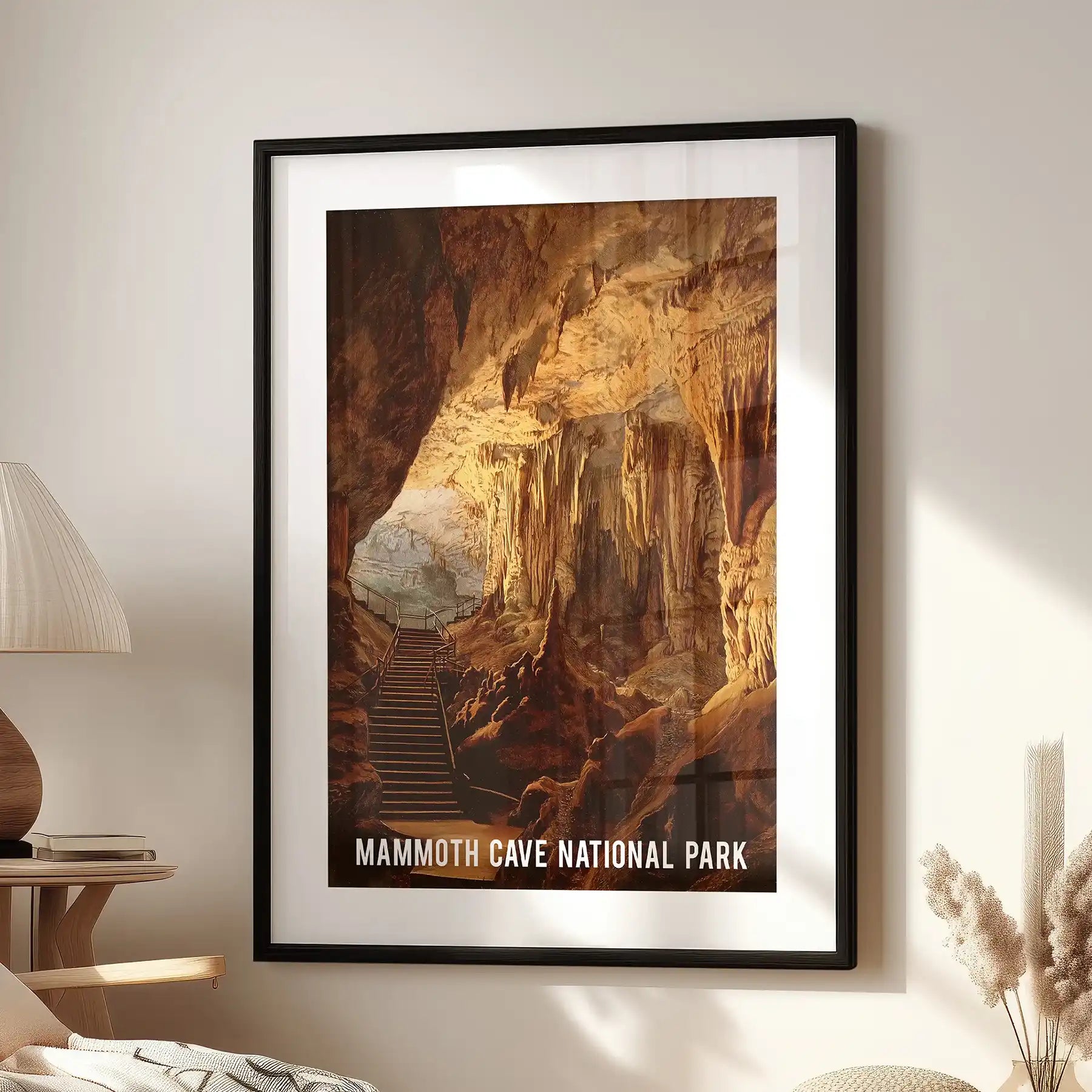 Underground cavern scene single art piece presents warm earth tones in a black frame with mat, set in the lounge beside the window chair for a calm, graphic feel.